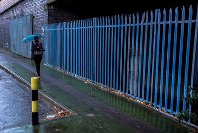 Woman standing on street