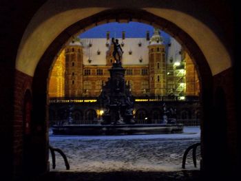 View of illuminated buildings in city