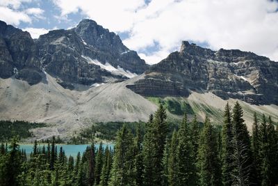 Scenic view of mountains against cloudy sky