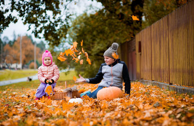 Siblings enjoying at park