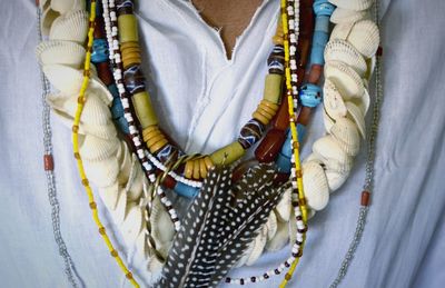 Close-up of traditional woman wearing bead necklaces