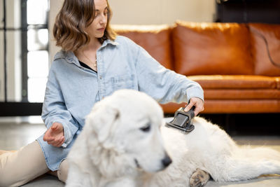 Woman with dog at home