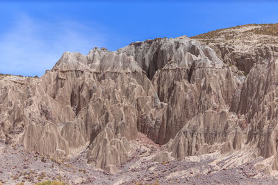 Scenic view of rocky mountains against sky