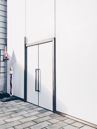 Man standing in front of building