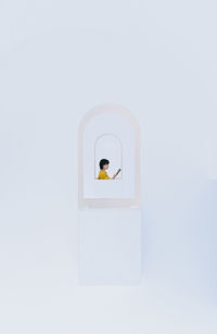 Close-up of open window on white wall