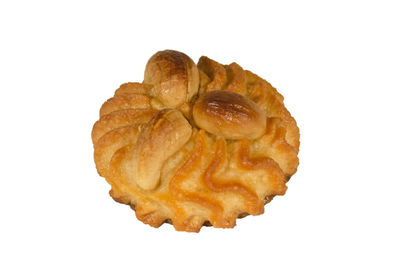 Close-up of bread against white background