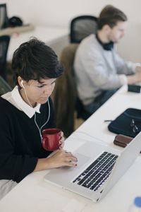 Young woman using mobile phone