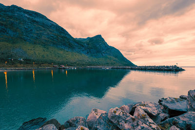 Scenic view of lake against sky during sunset