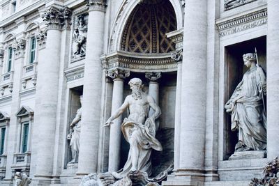 Statues in a historical building in rome city center italy