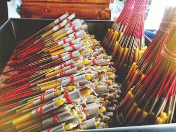 High angle view of incense and candles at market stall