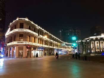 Illuminated buildings in city at night