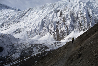 Solo trekker on mountain, enjoying in nature, landscape photography