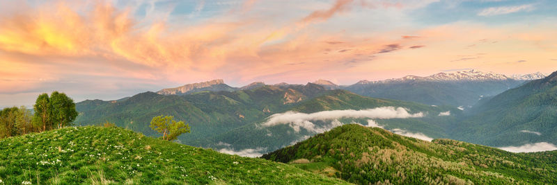 Scenic view of landscape against sky during sunset