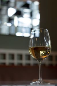 Close-up of wine glass on table