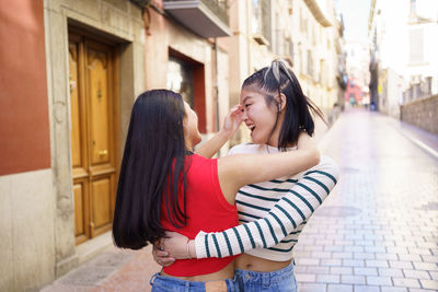 Side view of young woman looking away