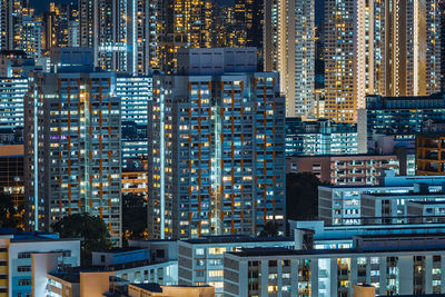 Modern buildings in city at night