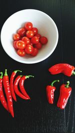 High angle view of red chili peppers on table