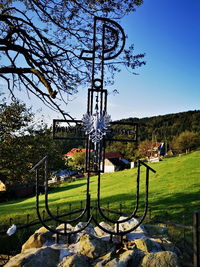 Built structure on field against clear sky