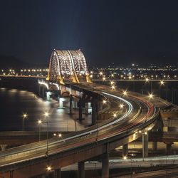 High angle view of illuminated city at night