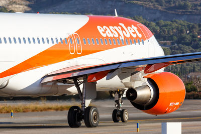 View of airplane at airport runway