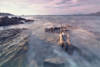 Scenic view of sea against sky during sunset