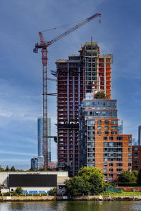 Buildings in city against sky