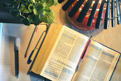 High angle view of open book on table