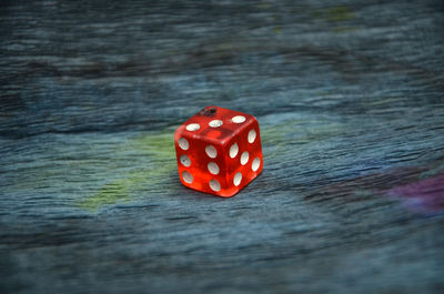 Close-up of rice dice on wooden table