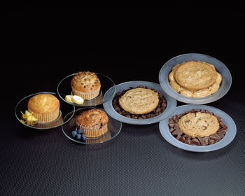 High angle view of cake on table against black background