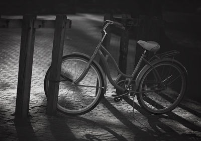 Bicycle parked against wall