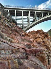 Low angle view of bridge against sky