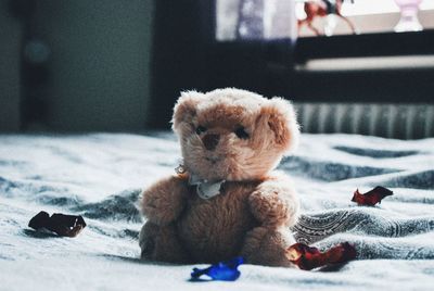 Close-up of stuffed toy on bed at home