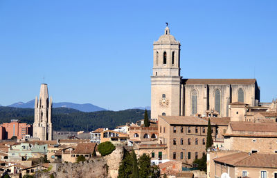 High angle view of church against blue sky