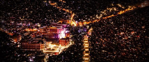Illuminated cityscape at night