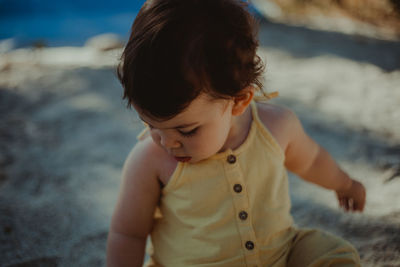 Cute girl playing at beach