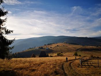 Scenic view of field against sky