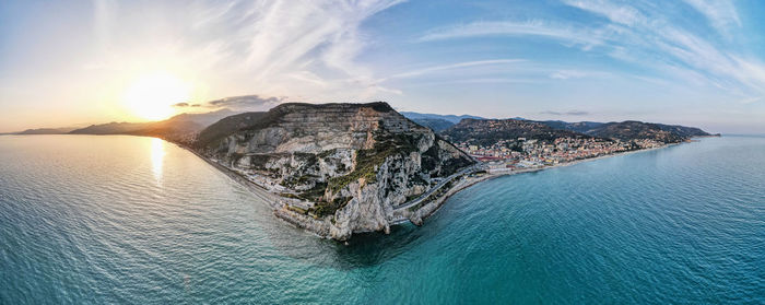 Panoramic view of sea against sky during sunset