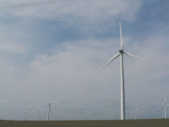 Wind turbines on field