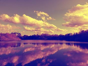 Scenic view of lake at sunset