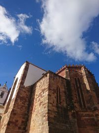 Low angle view of historic building against sky