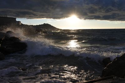 Scenic view of sea against sky during sunset