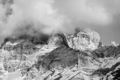 Rock formation on land against sky