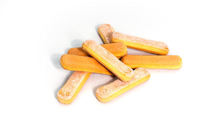 Close-up of bread against white background