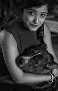 Portrait of teenage girl with dog