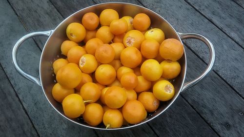 High angle view of fruits in bowl on table