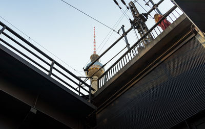 Low angle view of fernsehturm against clear sky