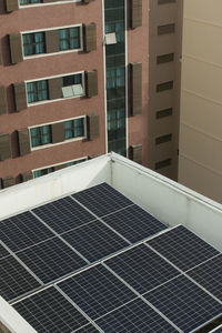 Solar panels installed on the terrace of a residential condominium
