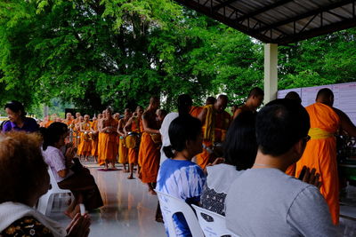 Rear view of people at temple