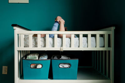 Side view of boy sleeping on bunkbed at home