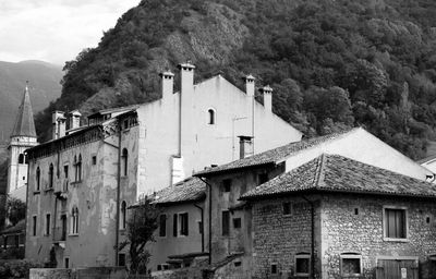 Buildings with mountain range in background